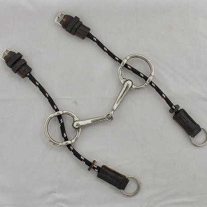 4 inch ring gag horse bit on a white surface.