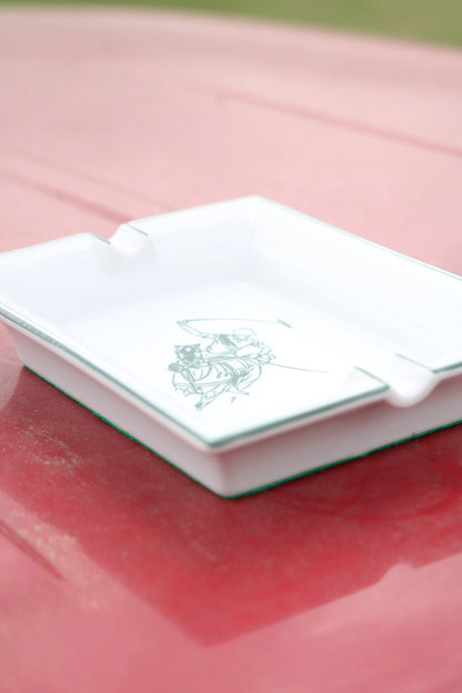 Side view of ash tray with Texas Polo logo and polo player graphic.