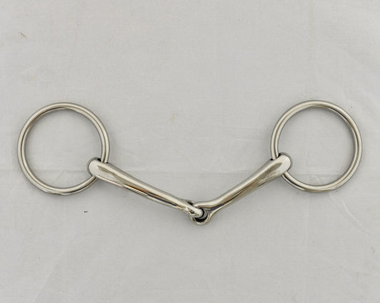 Badroon gag horse bit on a white surface.
