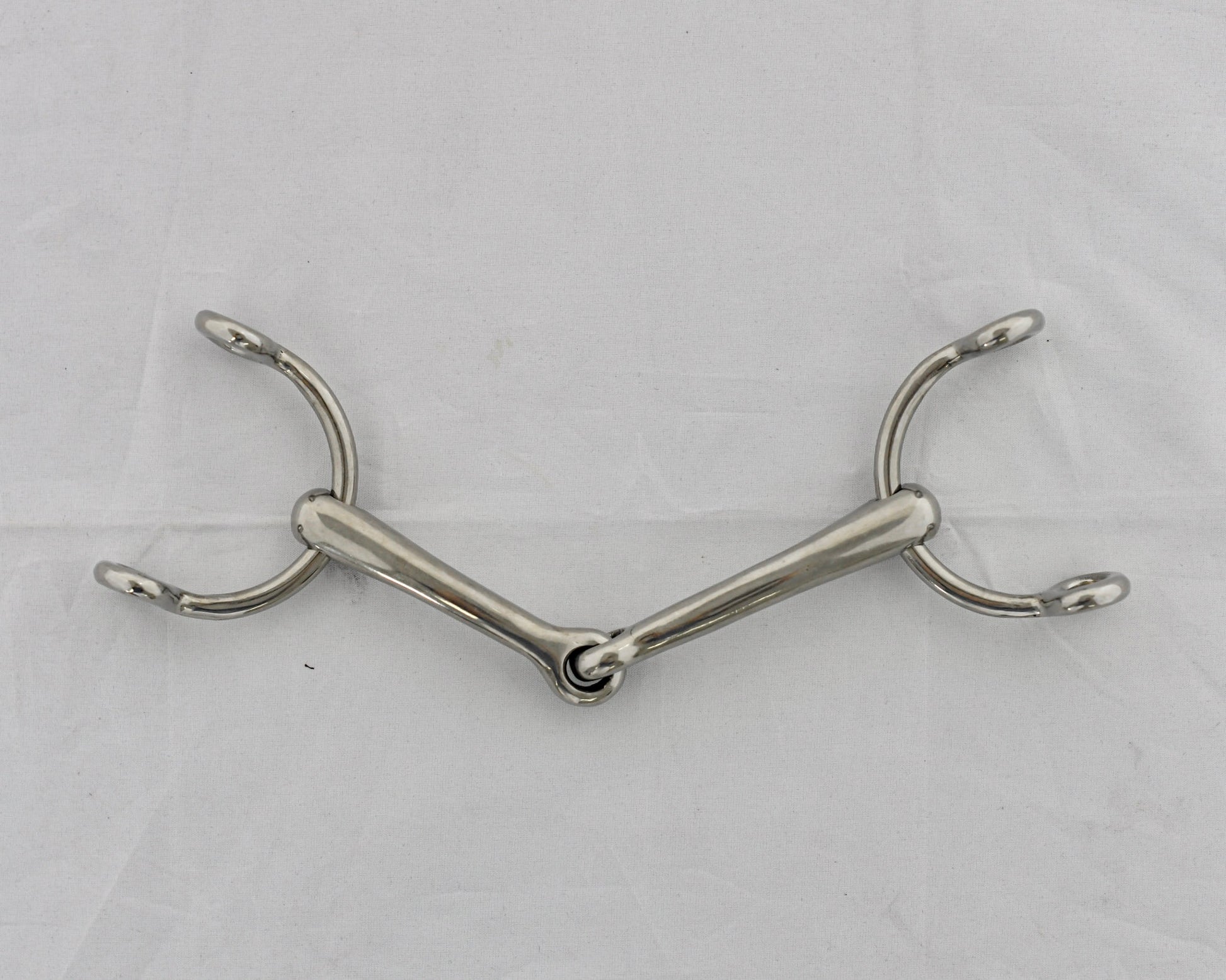 Dr. Bristol gag horse bit on a white surface.
