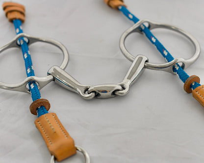 Close up of egg link gag on a white surface.