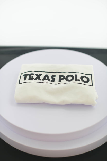 Folded white Texas Polo t-shirt.