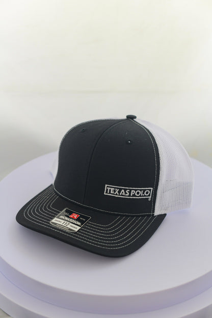 Black and white mesh back cap with small white Texas Polo logo.