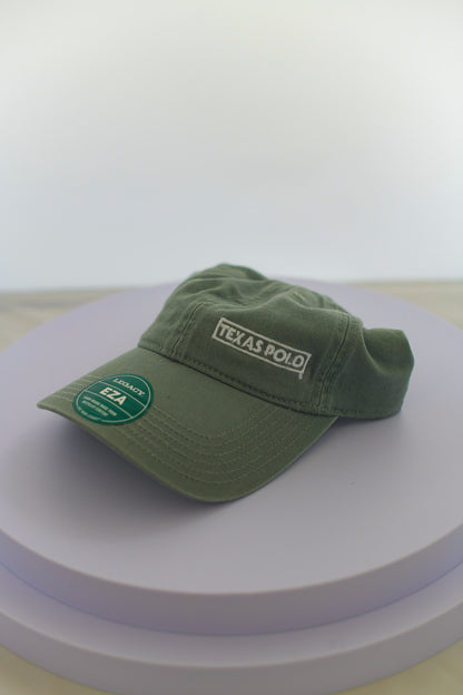 Light green hat with small white Texas Polo logo.