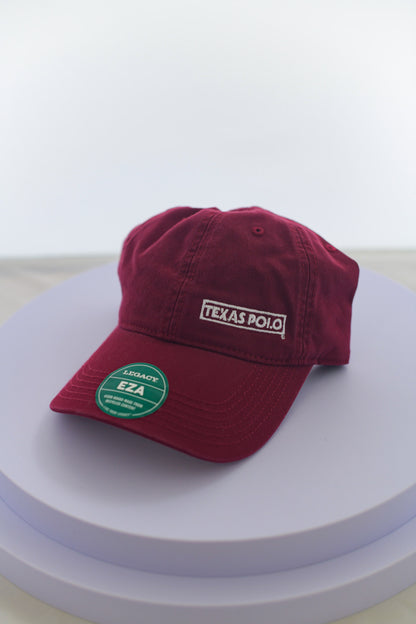 Maroon hat with small white Texas Polo logo.