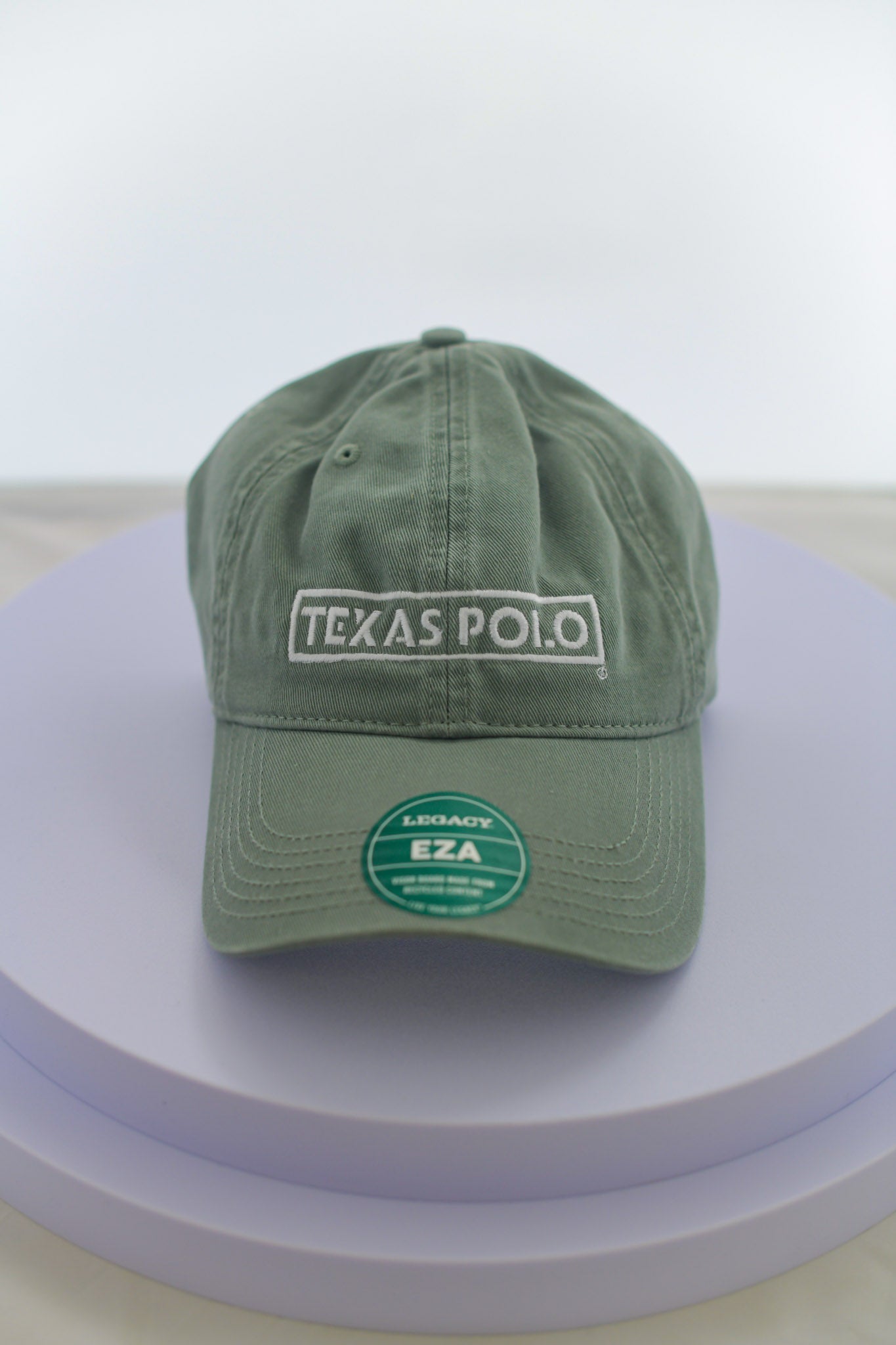 Light green hat with large white Texas Polo logo.