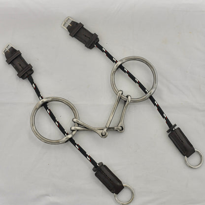 Plain barry gag horse bit on a white surface.
